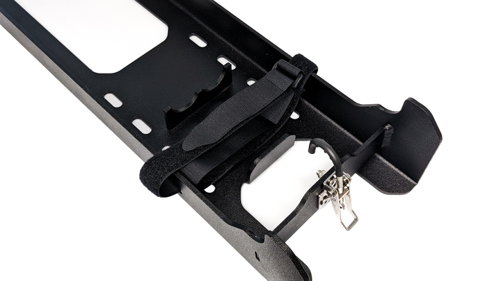 Close up of lock and strap mechanism on mounting bracket for Titan terrain jack 
