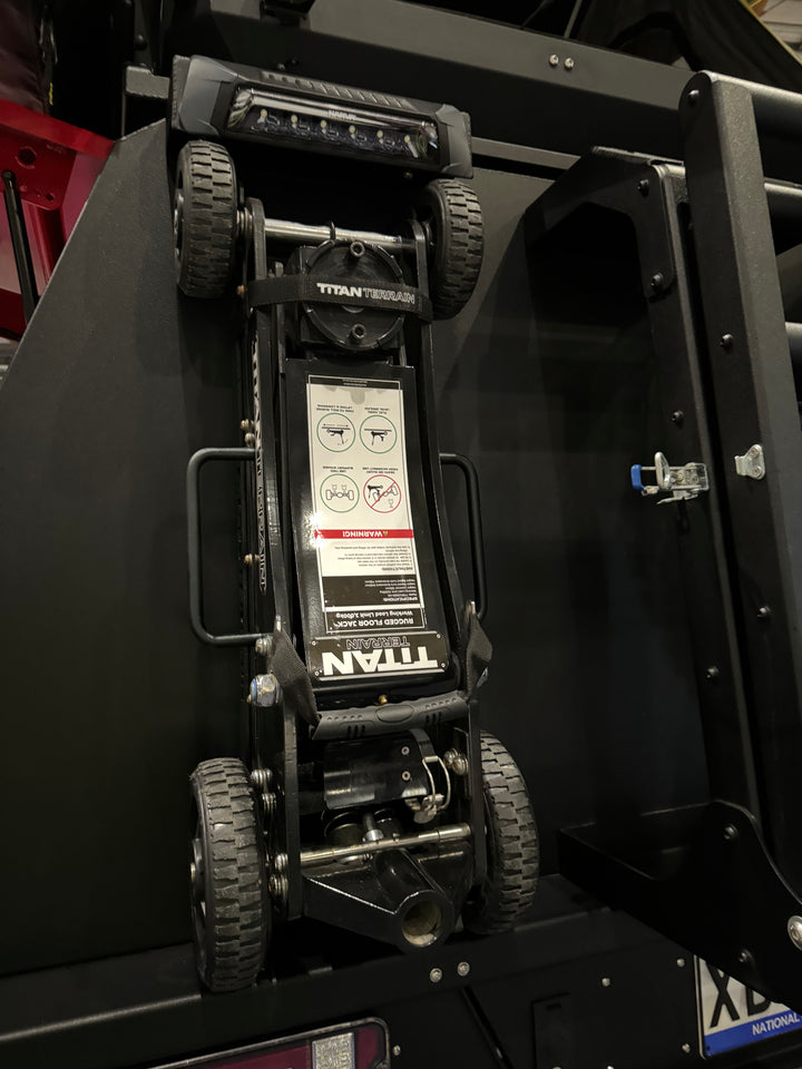 rugged floor jack mounted on ute canopy using mounting bracket