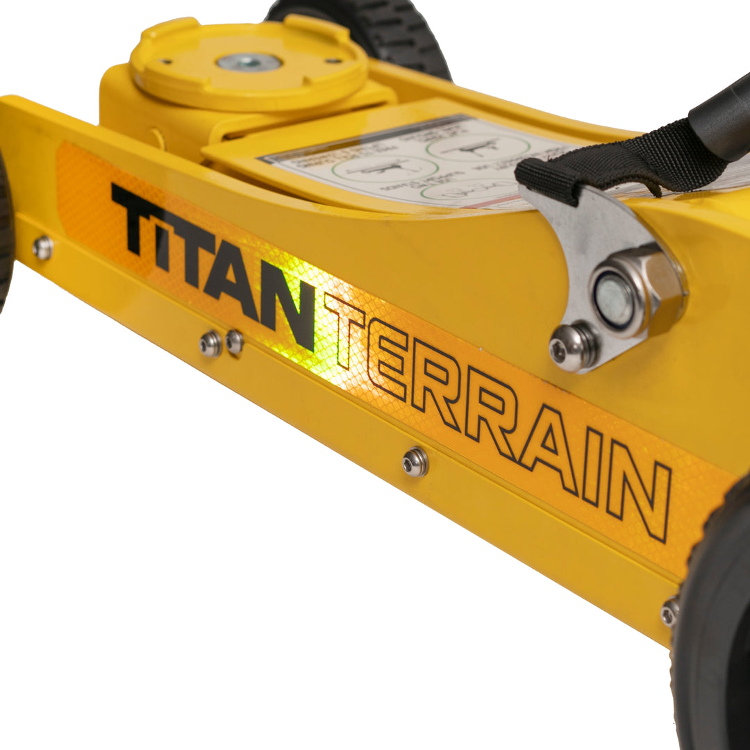 Close-up shot of reflective sticker on Yellow Titan Terrain rugged floor jack