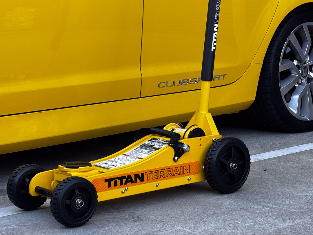 Titan Terrain 3 tonne rugged floor jack in hi-vis yellow