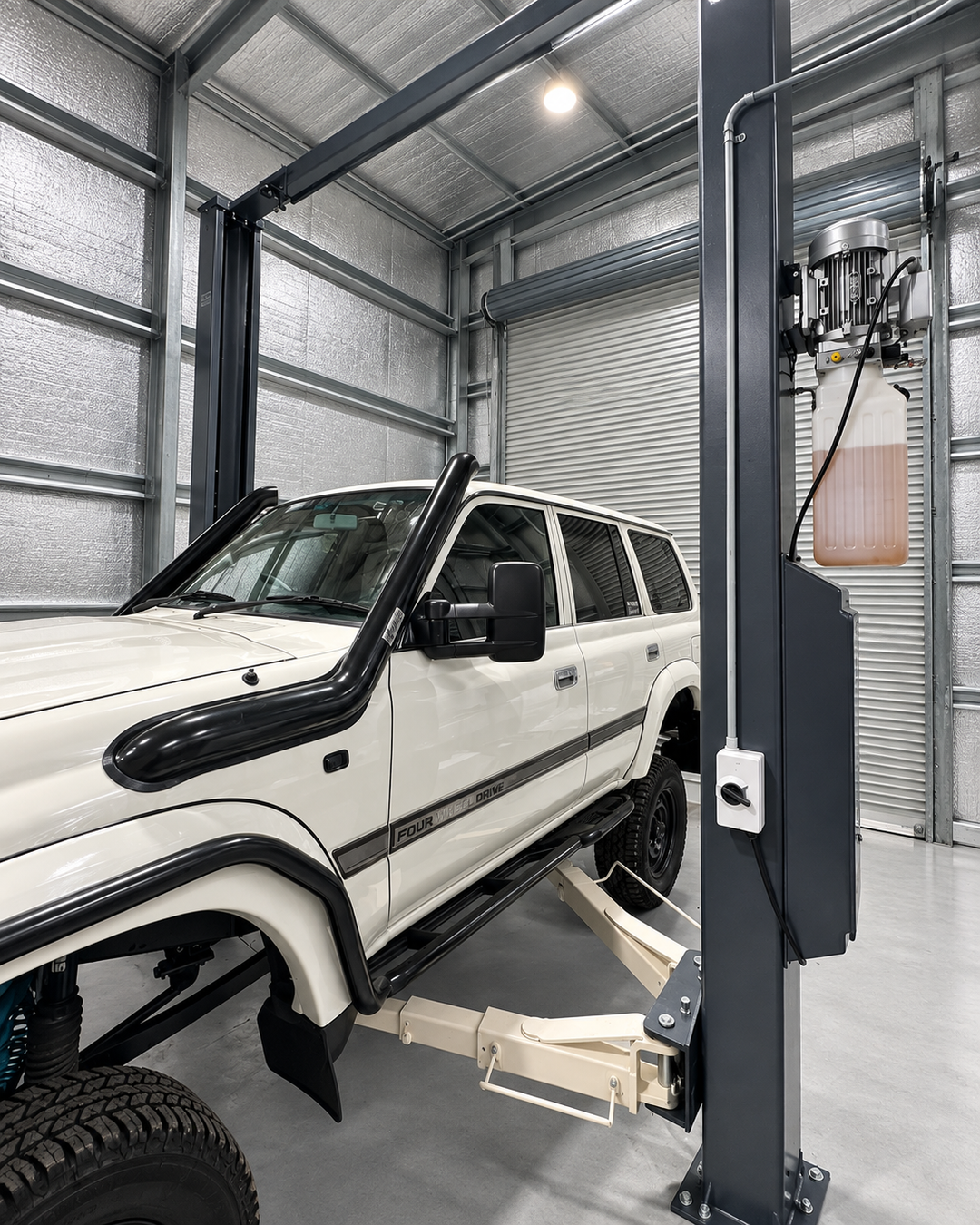 TTN Industrial 4.5 tonne 2-post car hoist with dual electric lock release